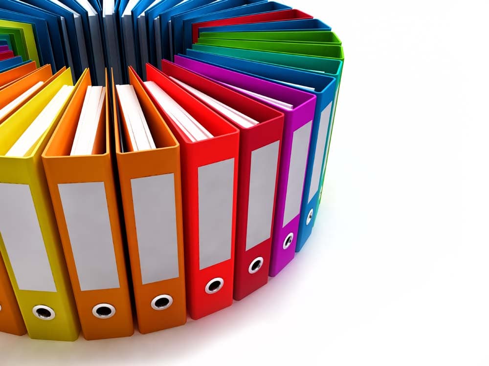 Bunte Ordner stehen im Kreis. | Motiv © adimas - Fotolia.com | © fotolia.com, Februar 2014
